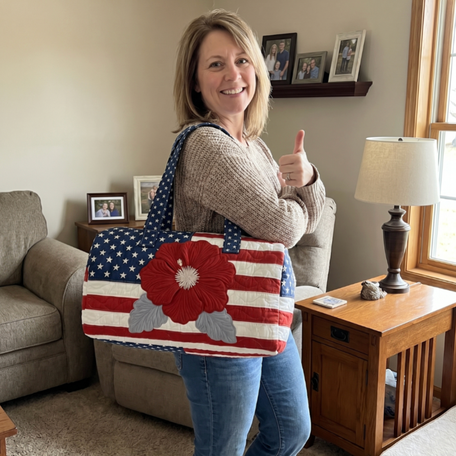 Woman holding a bag with an American flag design in a living room.